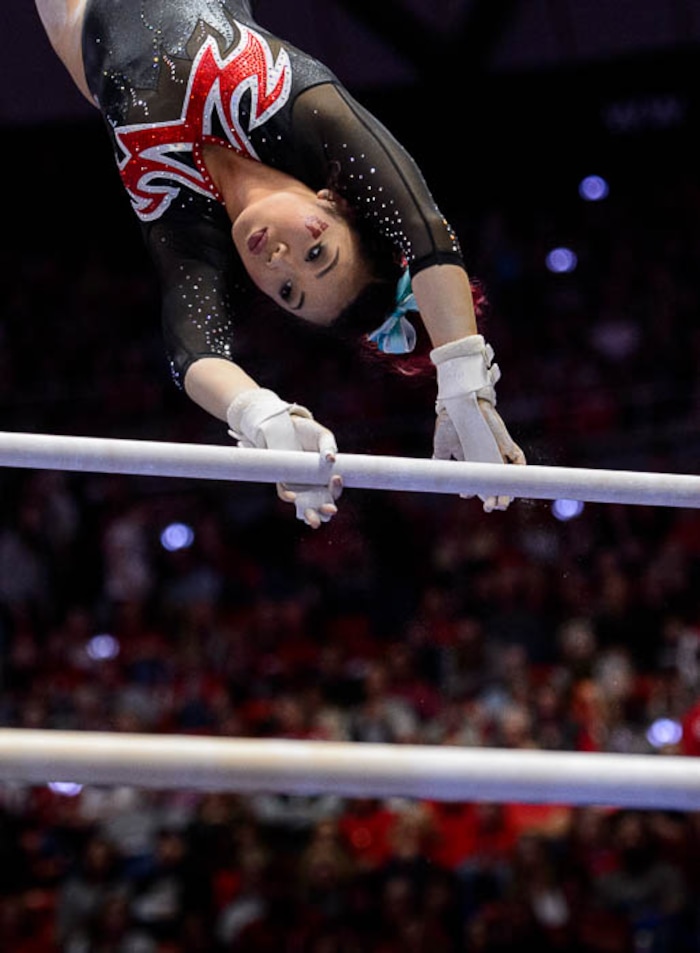 (Trent Nelson | The Salt Lake Tribune)  Kari Lee on bars as Utah hosts Washington, NCAA gymnastics in Salt Lake City, Saturday February 3, 2018.