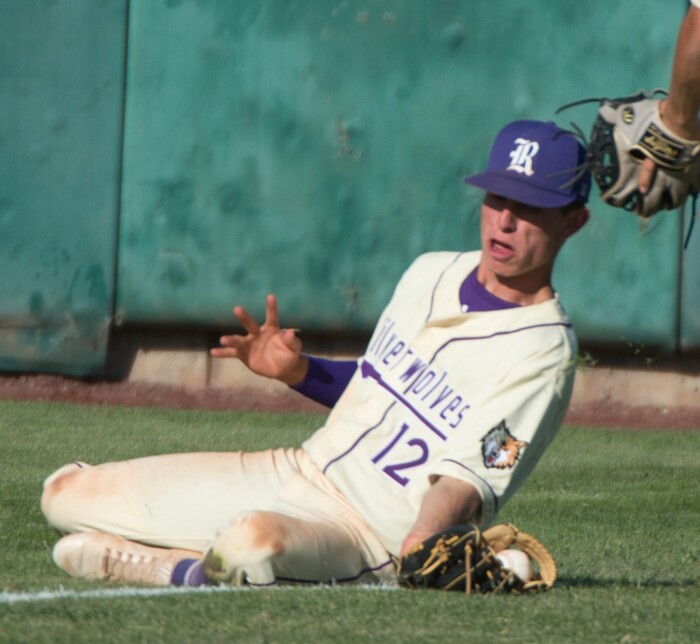 (Rick Egan  |  The Salt Lake Tribune)  Buddy Young makes a sliding catch for Riverton, in 6A state baseball State Championship game, at UVU in Orem, Friday, May 25, 2018.