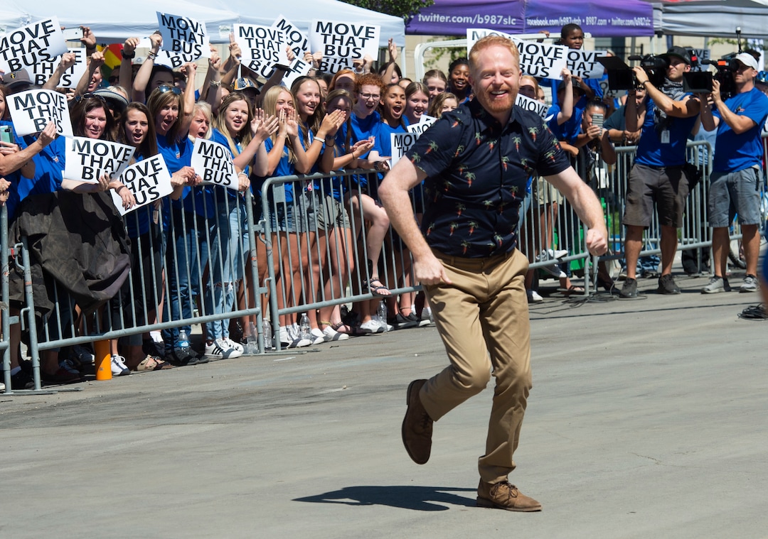(Rick Egan | The Salt Lake Tribune) Jesse Tyler Ferguson gets the crowd going while filming an episode of the TV show "Extreme Makeover: Home Edition" in Ogden, Thursday, Aug. 15, 2019.