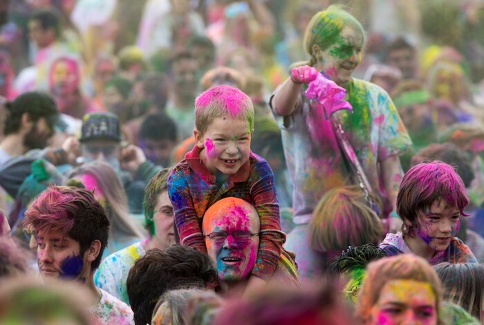 (Rick Egan  |  The Salt Lake Tribune)       Revelers dance to the sounds of Luminaries, during the 22nd annual Holi Festival of Colors at the Sri Sri Radha Krishna Temple in Spanish Fork, Saturday, March 24, 2018. 