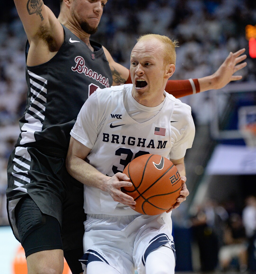 (Francisco Kjolseth  |  The Salt Lake Tribune) Santa Clara Broncos forward DJ Mitchell (0) pressures Brigham Young Cougars guard TJ Haws (30) on his way to the basket in the second half as the Brigham Young Cougars host the Santa Clara Broncos at the Marriott Center in Provo, Thursday, Feb. 20, 2020. BYU won 85-75.