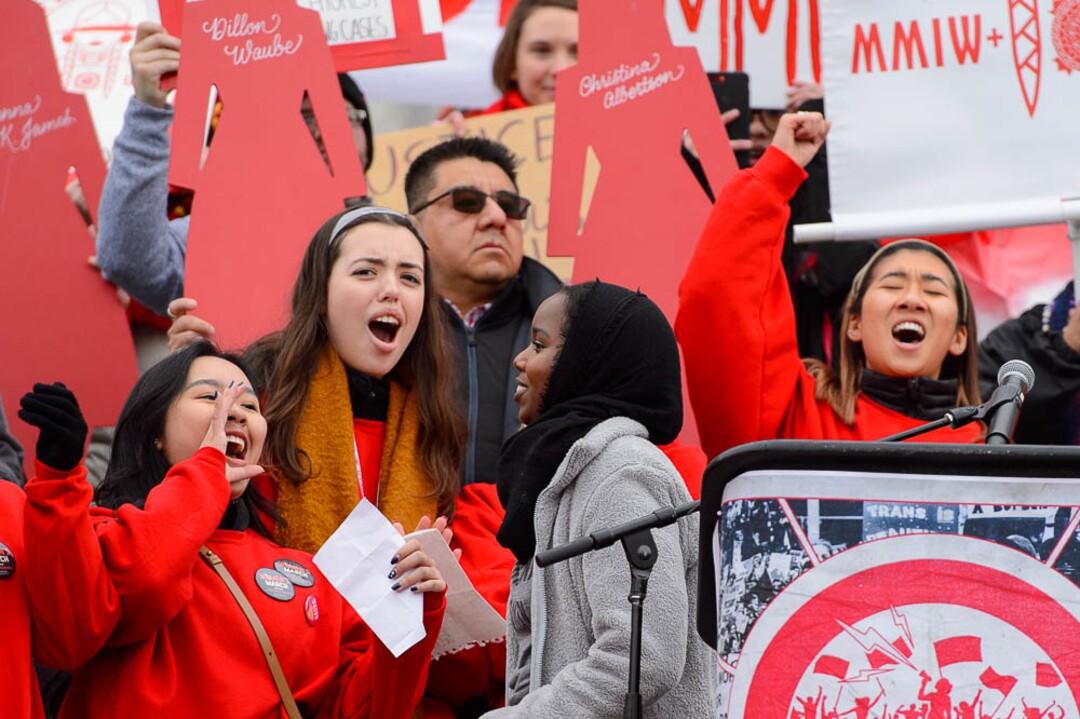 (Trent Nelson | The Salt Lake Tribune)Saida Dahir, center, is applauded after speaking at the 2019 Women's March on Utah in Salt Lake City on Saturday Jan. 19, 2019.