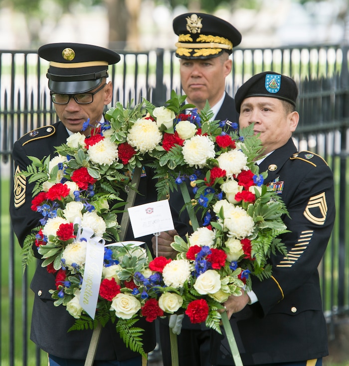 (Rick Egan  |  The Salt Lake Tribune)      
BG Doug Cherry, Dep Commanding General, 76th ORC walks with CSM Santi Khoudet (left) and (RET) Max Padua (right) for the laying of the wreath, during the Memorial Day observance at the Fort Douglas Cemetery,  Monday, May 28, 2018.


