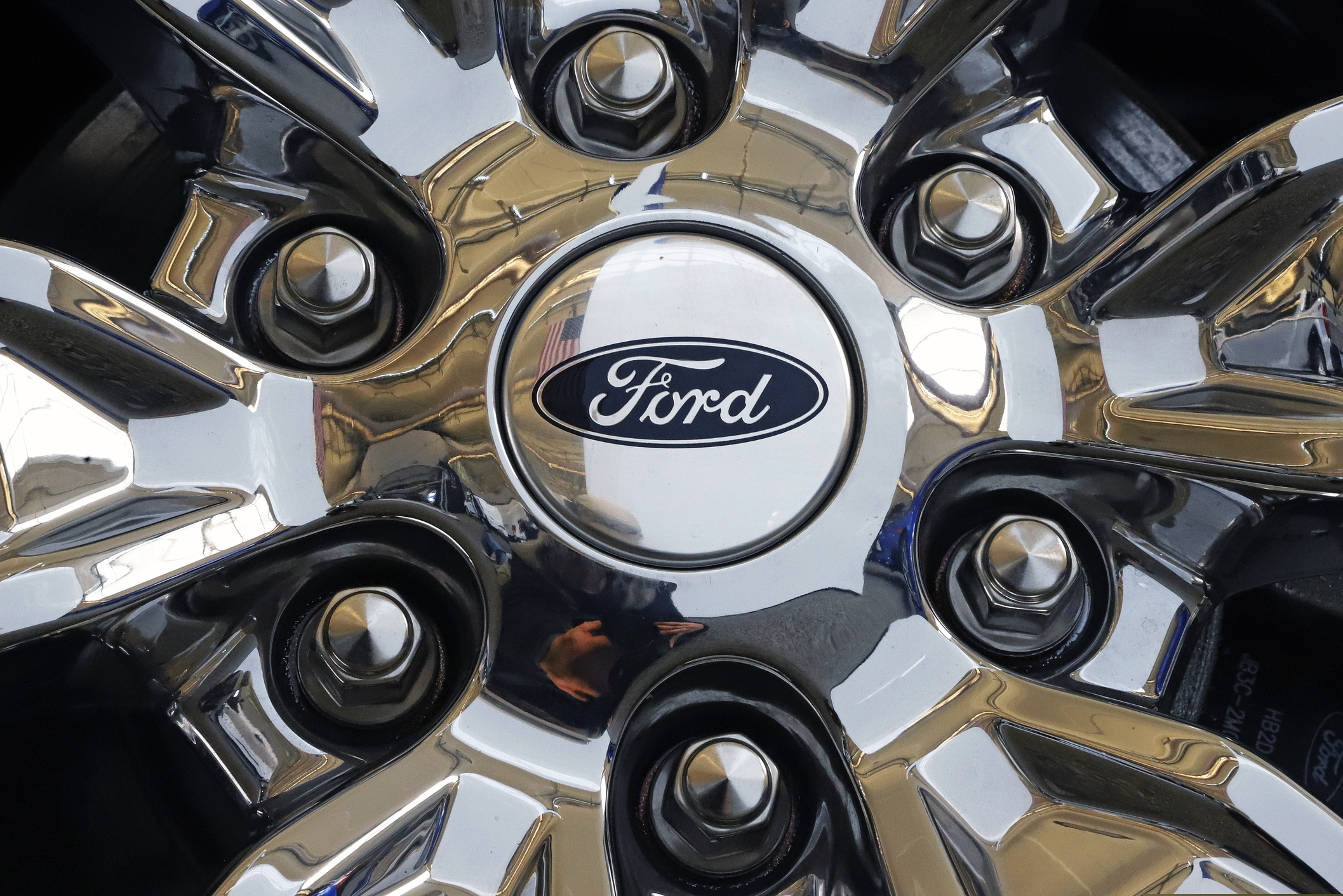 (Gene J. Puskar | AP file photo) Part of a 2019 Ford Expedition 4x4 is displayed at the 2019 Pittsburgh International Auto Show in Pittsburgh. Ford has said it was undertaking a major restructuring, and on Monday said that it will have trimmed thousands of jobs by August.