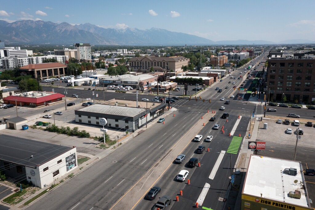 (Bethany Baker | The Salt Lake Tribune) Construction of a protected bike path extension along 300 West continues in Salt Lake City on Friday, July 18, 2025. A bill in the Utah Legislature directs Salt Lake City and the Utah Department of Transportation to "mitigate the impacts" of the street's redesign.