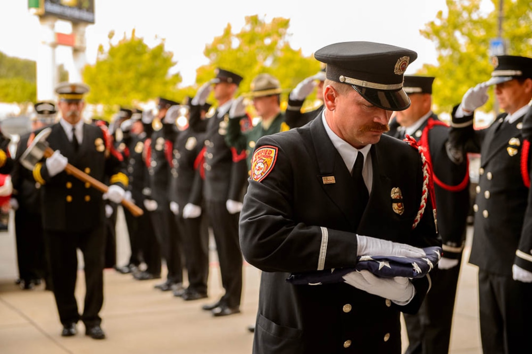 (Trent Nelson | The Salt Lake Tribune)  Honor Guard at the funeral services for Battalion Chief Matthew Burchett at the Maverik Center in West Valley City, Monday Aug. 20, 2018.
