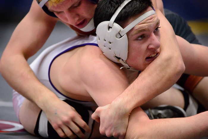 (Trent Nelson | The Salt Lake Tribune)  Brighton's Jaxson Wilde (top) and Box Elder's Brayden Tucker, 5A State Championships, high school wrestling quarterfinals in Orem, Wednesday February 7, 2018.