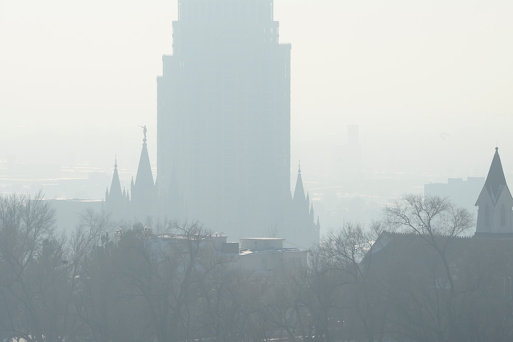 (Scott Sommerdorf | Tribune file photo) The Salt Lake Temple, seen through inversion conditions on Dec. 29, 2016. Lawmakers highlighted bills during the 2018 Utah Legislature addressing air quality, including measures to add regulators at the state Department of Environmental Quality and others targeting polluting emissions from vehicles.