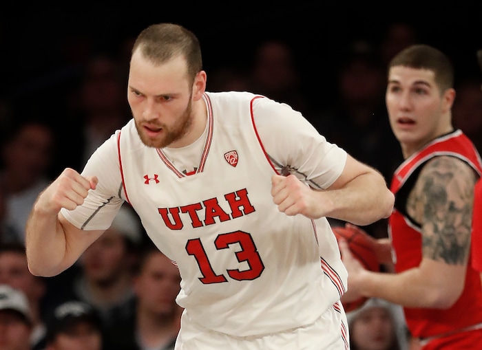 Utah forward David Collette (13) reacts after scoring against Western Kentucky during the second half of an NCAA college basketball game during the semifinals of the NIT, Tuesday, March 27, 2018, in New York. Utah won 69-64. (AP Photo/Julie Jacobson)