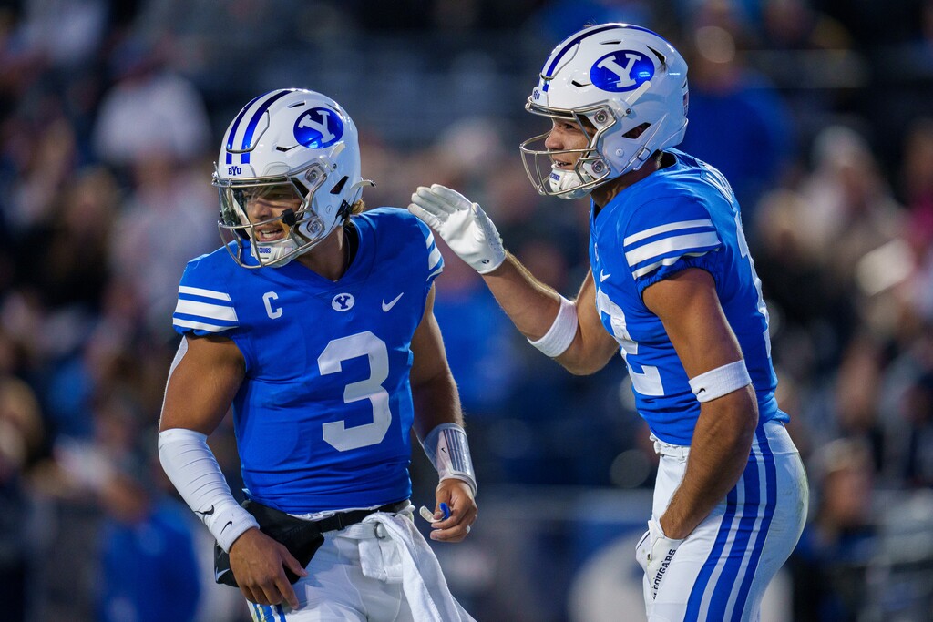 (Trent Nelson  |  The Salt Lake Tribune) Brigham Young Cougars quarterback Jaren Hall (3) and Brigham Young Cougars wide receiver Puka Nacua (12) celebrate a touchdown as BYU hosts East Carolina, NCAA football in Provo on Friday, Oct. 28, 2022.