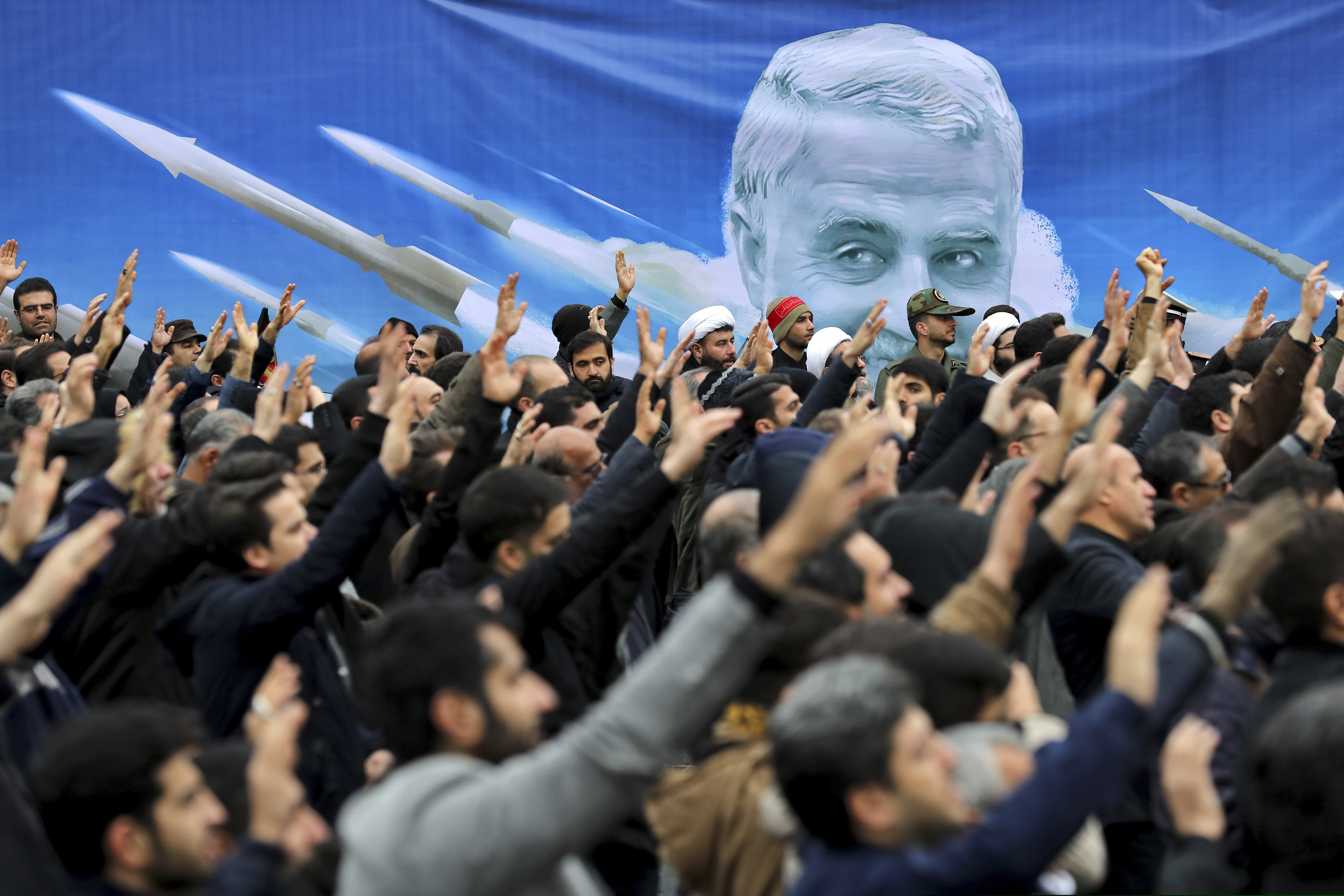 (Ebrahim Noroozi | AP) Protesters demonstrate over the U.S. airstrike in Iraq that killed Iranian Revolutionary Guard Gen. Qassem Soleimani in Tehran, Iran, Saturday Jan. 4, 2020.