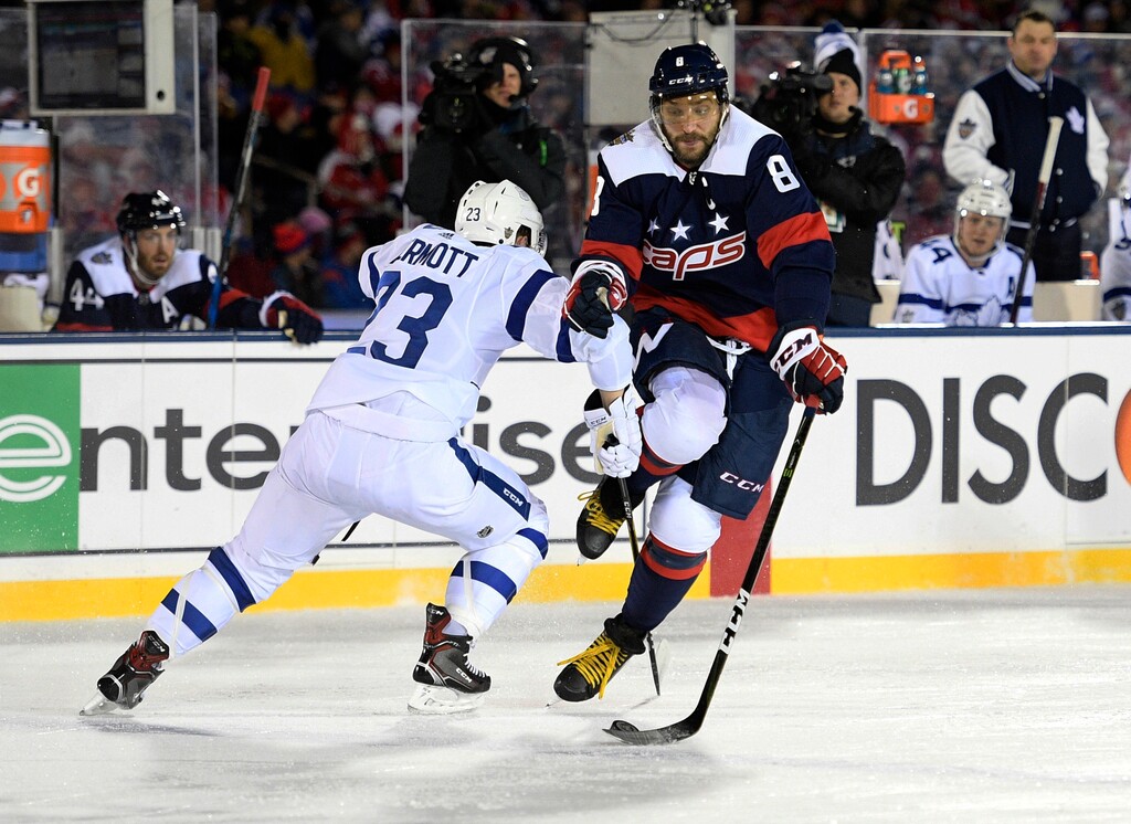 Washington Capitals left wing Alex Ovechkin (8), of Russia, skates with the puck against Toronto Maple Leafs defenseman Travis Dermott (23) during the second period of an NHL hockey game, Saturday, March 3, 2018, in Annapolis, Md. (AP Photo/Nick Wass)