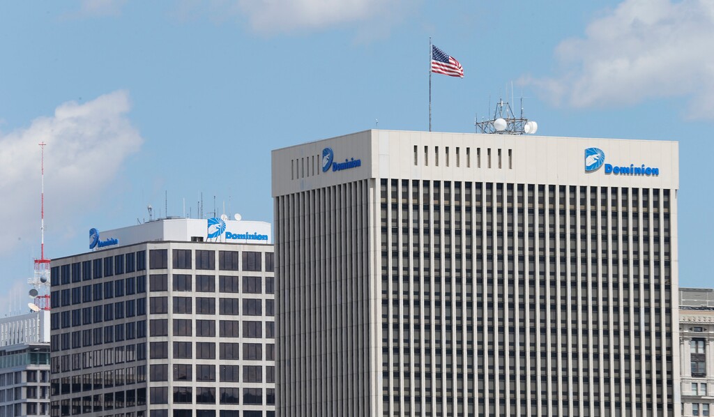 (Steve Helber | AP file photo) This April 28, 2015, file photo shows two Dominion Energy buildings in downtown Richmond, Va.