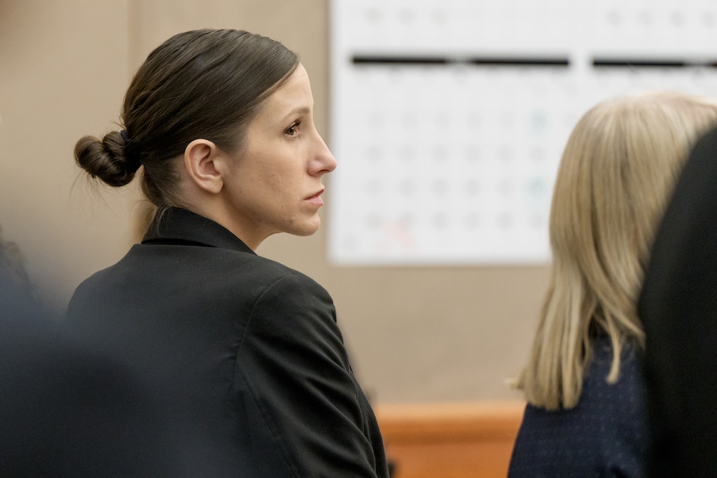 (Spenser Heaps | Pool) Kouri Richins, accused of fatally poisoning her husband, looks on during the first day of her murder trial at the Summit County Courthouse in Park City, Monday, Feb. 23, 2026.