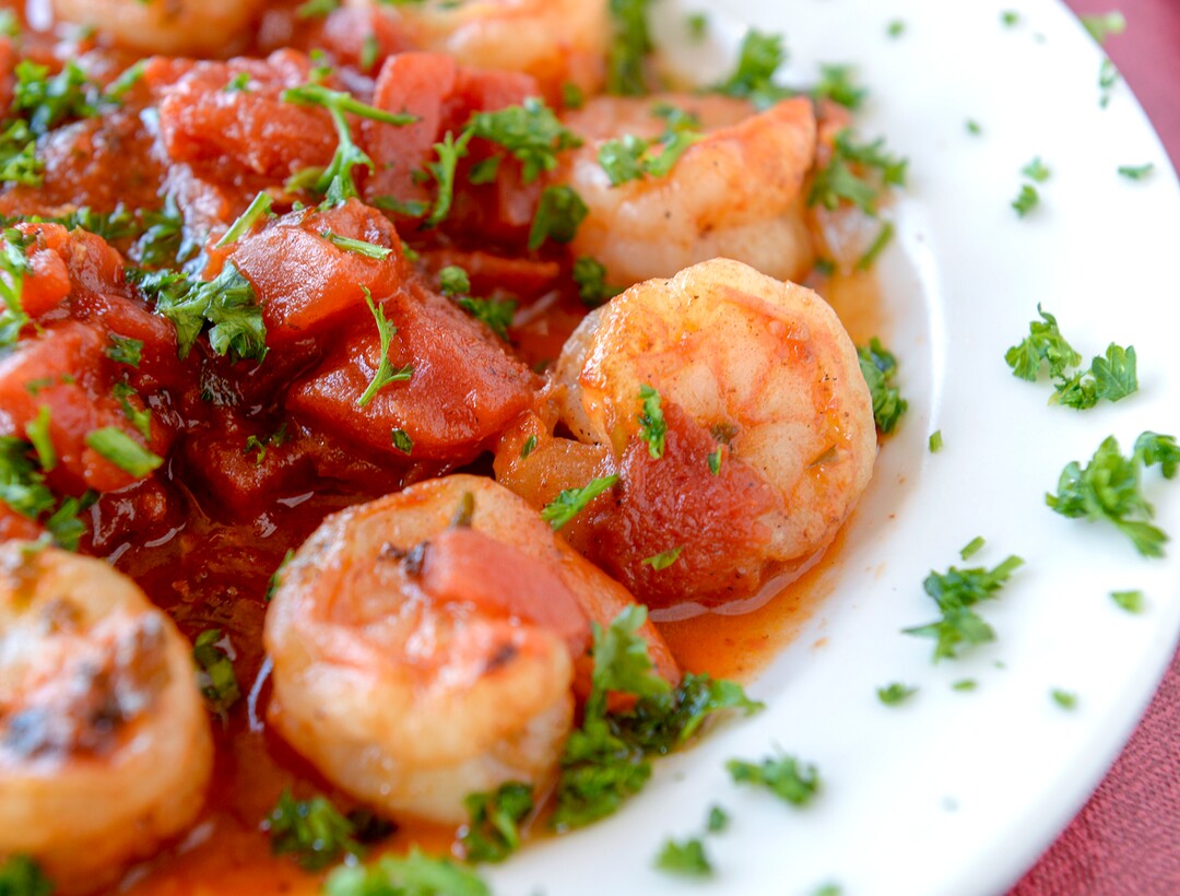 (Leah Hogsten  |  The Salt Lake Tribune) Shrimp Marrakech, sauteed shrimp with garlic in a sweet tomato paprika sauce served with pita at Pasha Middle Eastern Cuisine, $9. Pasha Middle Eastern Cuisine specializes in a fusion of Moroccan, Mediteranean and Middle Eastern dishes, Aug. 14, 2019.