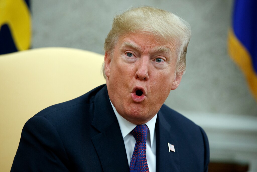 President Donald Trump speaks during a meeting with Governor Ricardo Rossello of Puerto Rico in the Oval Office of the White House, Thursday, Oct. 19, 2017, in Washington. (AP Photo/Evan Vucci)