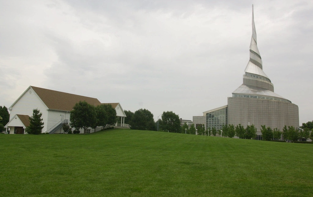(Orlin Wagner | AP) The Church of Christ, left, Temple Lot and the Community of Christ's temple and world headquarters, right, in Independence, Mo., in 2001.
