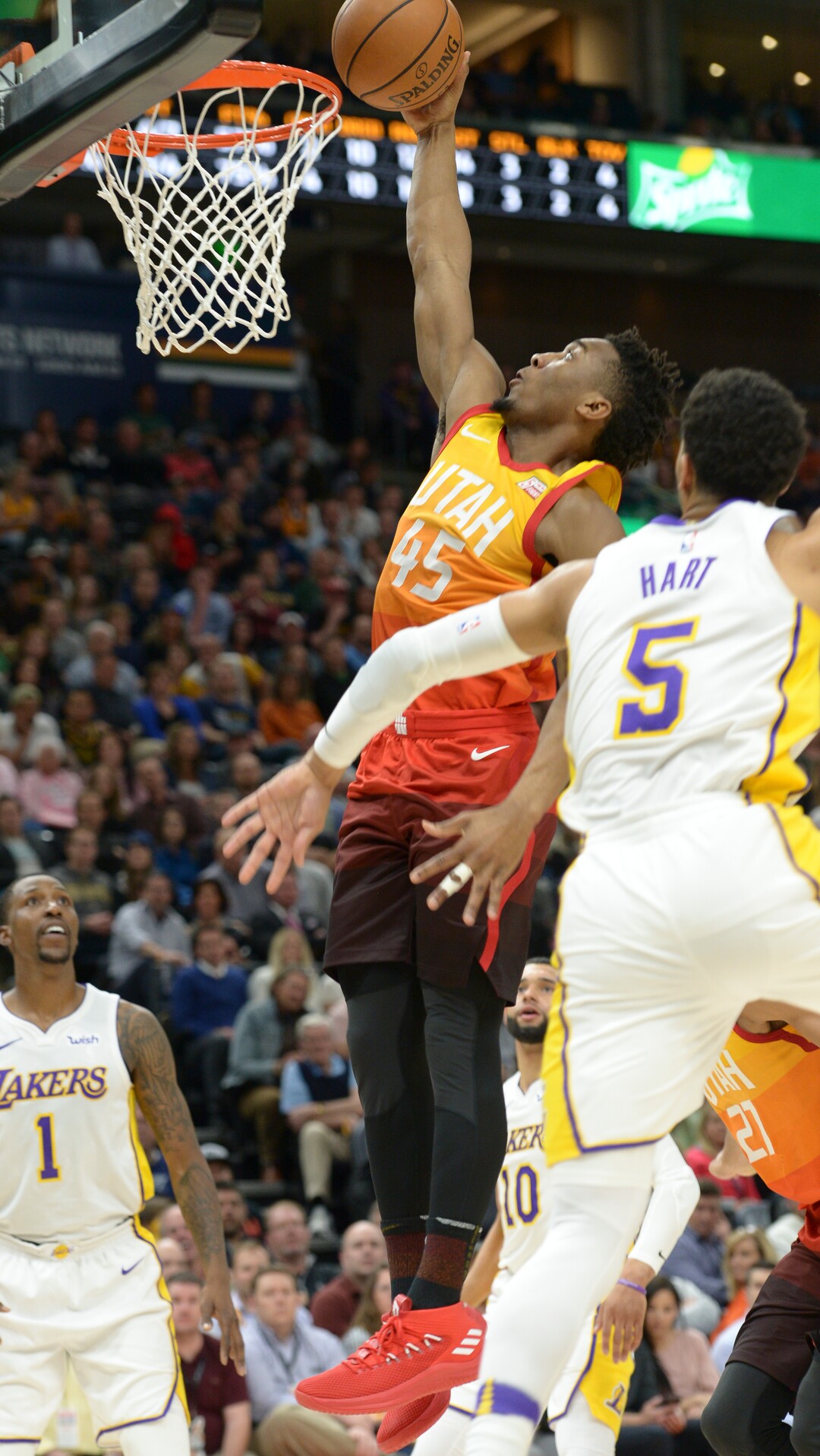 (Leah Hogsten  |  The Salt Lake Tribune)  Utah Jazz guard Donovan Mitchell (45) with the dunk as the Utah Jazz host the Los Angeles Lakers at Vivint Smart Home Arena Tuesday, April 3, 2018
