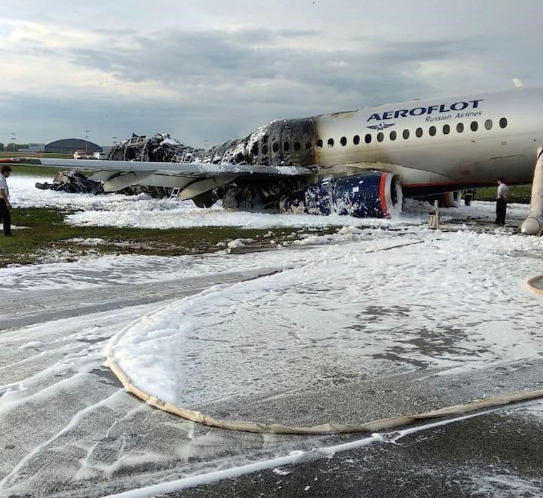 (Photo courtesy of Moscow News Agency via The Associated Press) The Sukhoi Superjet 100 aircraft of Airflot Airlines, center, is seen after an emergency landing in Sheremetyevo airport in Moscow, Russia, Sunday, May 5, 2019.