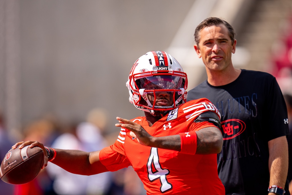(Trent Nelson | The Salt Lake Tribune) Utah Utes quarterback Devon Dampier (4) and quarterbacks coach Ryan Gunderson as Utah hosts Utah State, NCAA football in Salt Lake City on Saturday, Sept. 19, 2026.