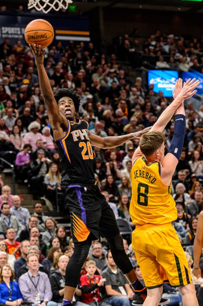 (Trent Nelson | The Salt Lake Tribune)  Phoenix Suns forward Josh Jackson (20) scores as the clocks runs out on the first quarter as the Utah Jazz host the Phoenix Suns, NBA basketball in Salt Lake City, Wednesday Feb. 14, 2018.