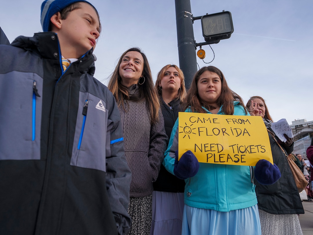 (Leah Hogsten | The Salt Lake Tribune) Members of the Logsdon family from Orlando, Fla., from left, Spencer, Vivian, Emma and Sofia, stand outside the Conference Center hoping to snag some tickets to the morning session of General Conference on Saturday, April 1, 2023.