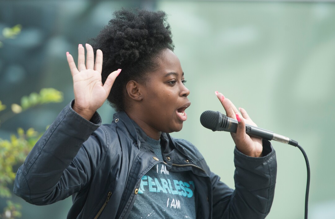 (Rick Egan  |  The Salt Lake Tribune)  Natalie Pinckney leads the crowd in "hands up don't shoot" during a Black Lives Matter protest against police brutality. The protesters are calling for the release of body camera footage of an officer fatally shooting 50-year-old Patrick Harmon at the Salt Lake City Public Safety Building, Saturday, September 30, 2017.
