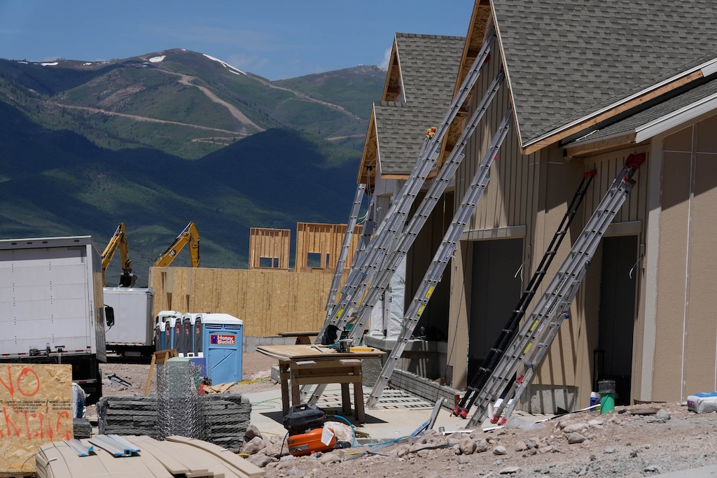 (Francisco Kjolseth  |  The Salt Lake Tribune) Deer Valley is seen the background as housing units are constructed at the Jordanelle Ridge development in Heber City on Friday, June 7, 2024.