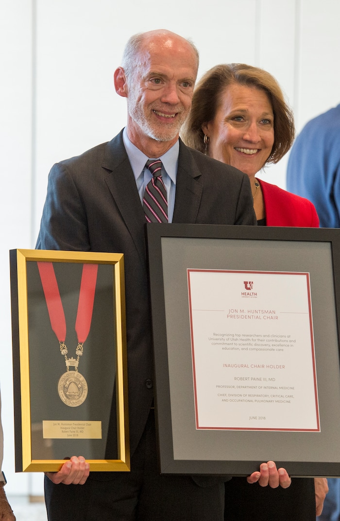 (Rick Egan  |  The Salt Lake Tribune)      Robert Paine III  stands  with University of Utah and President Ruth V. Watkins as the University of Utah six new Jon M. Huntsman Presidential Chairs, funded by the Huntsman Family Foundation, during a ceremony at the Alumni House, Tuesday, June 19, 2018.


