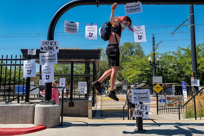 (Trent Nelson | The Salt Lake Tribune) Protesters taped posters at the University of Utah in Salt Lake City on Thursday, Sept. 3, 2020. The protest called for President Ruth Watkins to resign and for the campus police department to be dissolved..