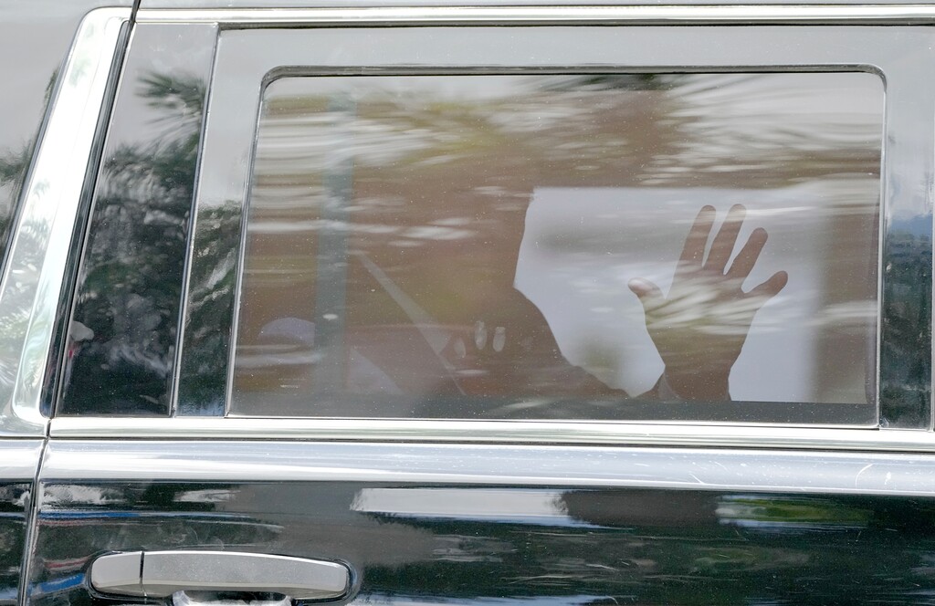 (Jim Rassol | The Associated Press) Former President Donald Trump leaves his Trump National Doral resort, Tuesday, June 13, 2023 in Doral, Fla.