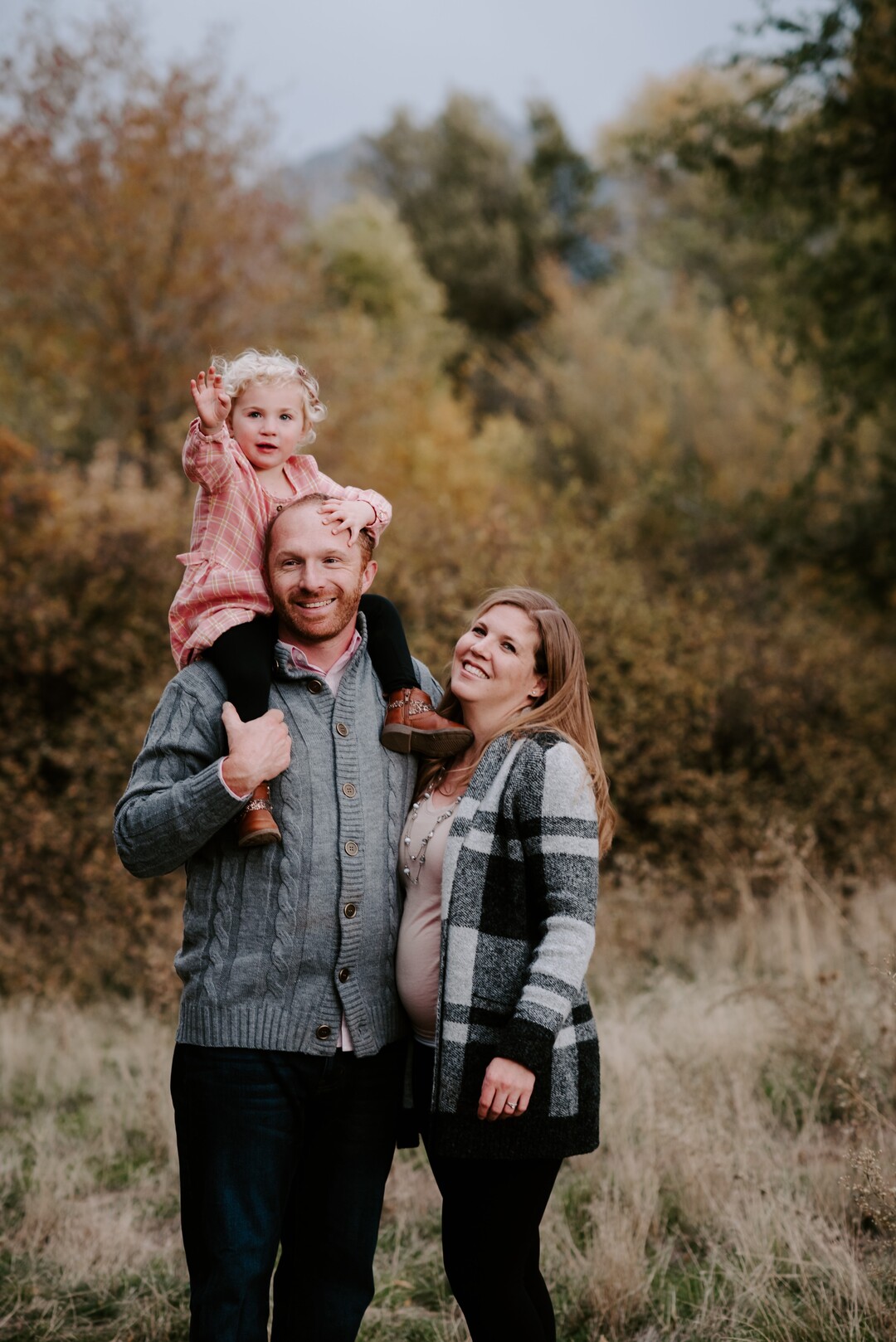 (Photo Courtesy of Alex Adams) Pictured is Damon and Tarah Bryan and their daughter, Ainsley.