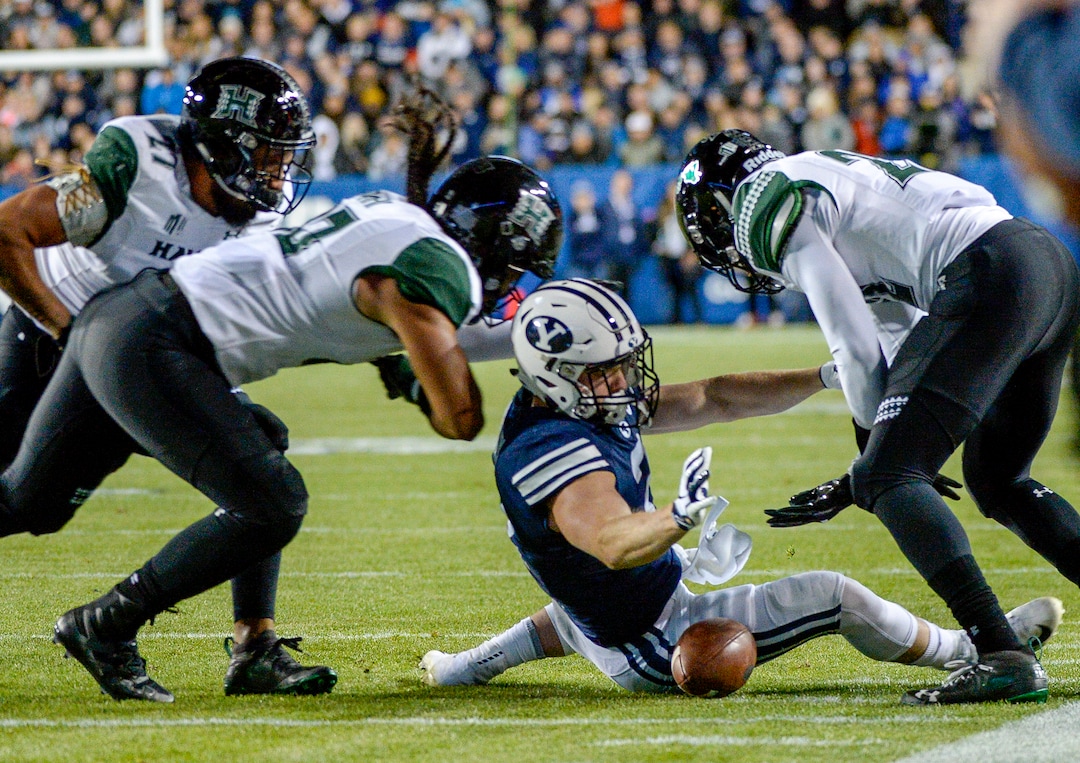 Leah Hogsten  |  The Salt Lake Tribune  Brigham Young Cougars running back Matt Hadley (2) recovers his fumble as Brigham Young University hosts Hawaii at Lavell Edwards Stadium in Provo, Saturday Oct. 13, 2018. 