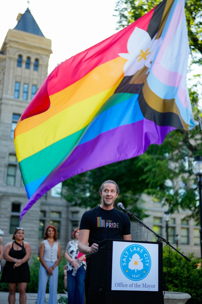 (Francisco Kjolseth | The Salt Lake Tribune) Chad Call, Executive Director of the Utah Pride Center, speaks during the annual raising of the pride flag at City Hall to kickstart a month of festivities for Utah Pride on Friday, May 30, 2025. It is especially notable this year given the state tried to stop the pride flag from flying over government grounds.