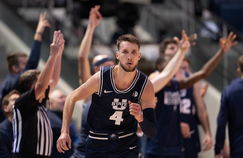 (Francisco Kjolseth | The Salt Lake Tribune) Utah State Aggies forward Brandon Horvath scores against the Brigham Young Cougars on Wednesday, Dec. 8, 2021. Horvath's double-double on Wednesday helped USU beat Air Force to open the Mountain West Conference tournament in Las Vegas.