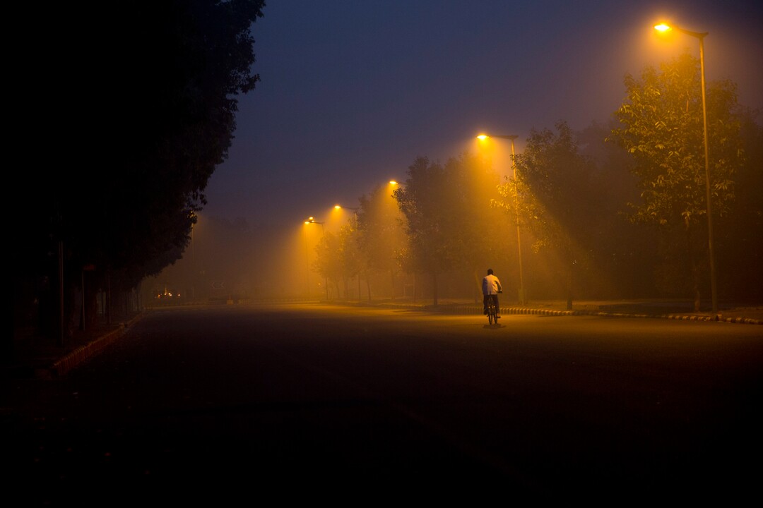 A cyclist pedals through the morning smog a day after Diwali festival, in New Delhi, India, Friday, Oct. 20, 2017. Environmental pollution - from filthy air to contaminated water - is killing more people every year than all war and violence in the world. One out of every six premature deaths in the world in 2015 - about 9 million - could be attributed to disease from toxic exposure, according to a major study released Thursday, Oct. 19, 2017 in The Lancet medical journal. (AP Photo/Manish Swarup)