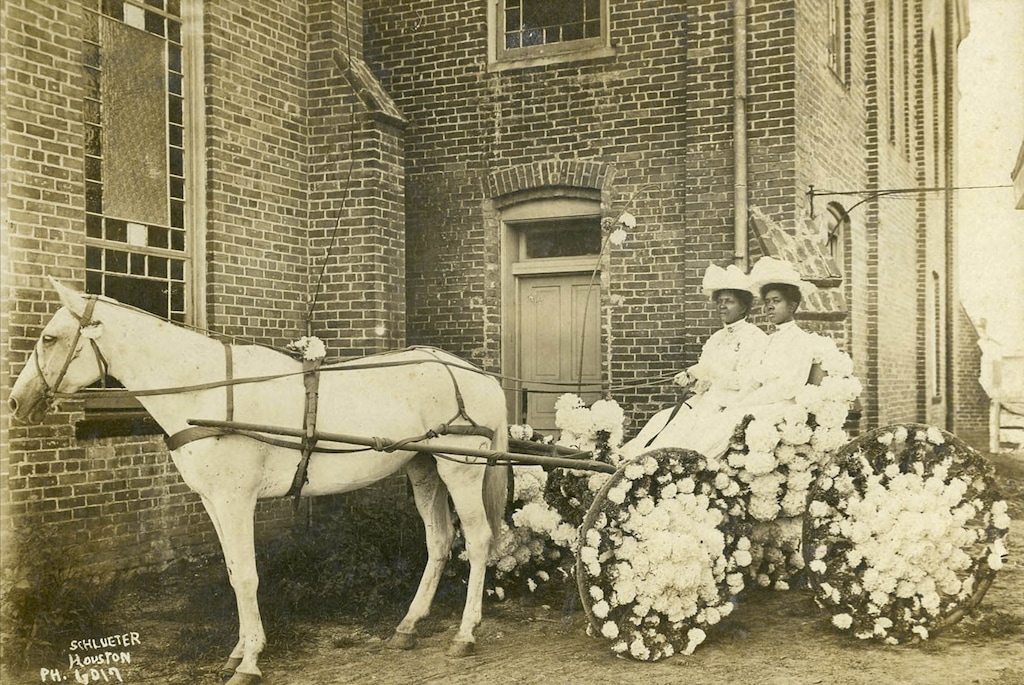 A 1908 photograph of two women in Texas sitting in a buggy decorated with flowers for the annual Juneteenth Celebration parked in front of Antioch Baptist Church located in Houston’s Fourth Ward. (Houston Public Library, African American Library at the Gregory School) 

--

ONLY FOR USE WITH ARTICLE SLUGGED -- BC-OPED-HOLT-JUNETEENTH-FREEDOM-ART-NYTSF -- OTHER USE PROHIBITED.
