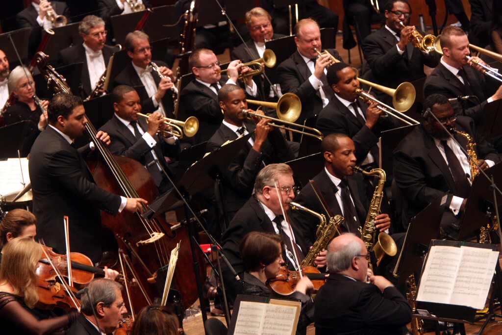 (Hiroyuki Ito | The New York Times) Orchestra musicians perform in New York on Sept. 22, 2010. Rearranging musicians could significantly reduce aerosol buildup on stage, a new study says.