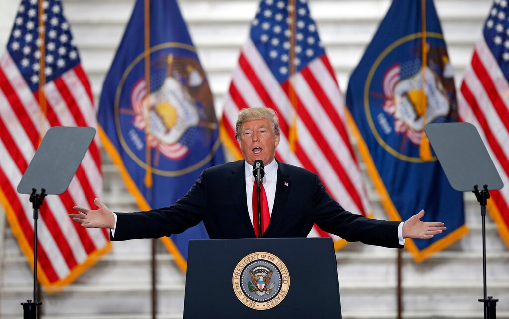 President Donald Trump speaks at the Utah State Capitol Monday, Dec. 4, 2017, in Salt Lake City. Trump traveled to Salt Lake City to announce plans to shrink two sprawling national monuments in Utah in a move that will delight the state's GOP politicians and many rural residents who see the lands as prime examples of federal overreach, but will enrage tribes and environmentalist groups who vow to immediately sue to preserve the monuments. (AP Photo/Rick Bowmer)