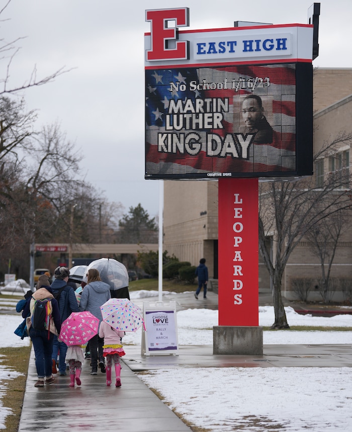 (Leah Hogsten | The Salt Lake Tribune) Over 200 people participated in the march from East High School to Kingsbury Hall on Monday. To commemorate the legacy and work of Martin Luther King, Jr. and many other activists fighting for racial equality during the Civil Rights movement, the University of Utah's office of Equity, Diversity & Inclusion kicked off MLK Week 2023 with a rally at East High School, followed by a march to Kingsbury Hall, Jan. 16, 2023. 