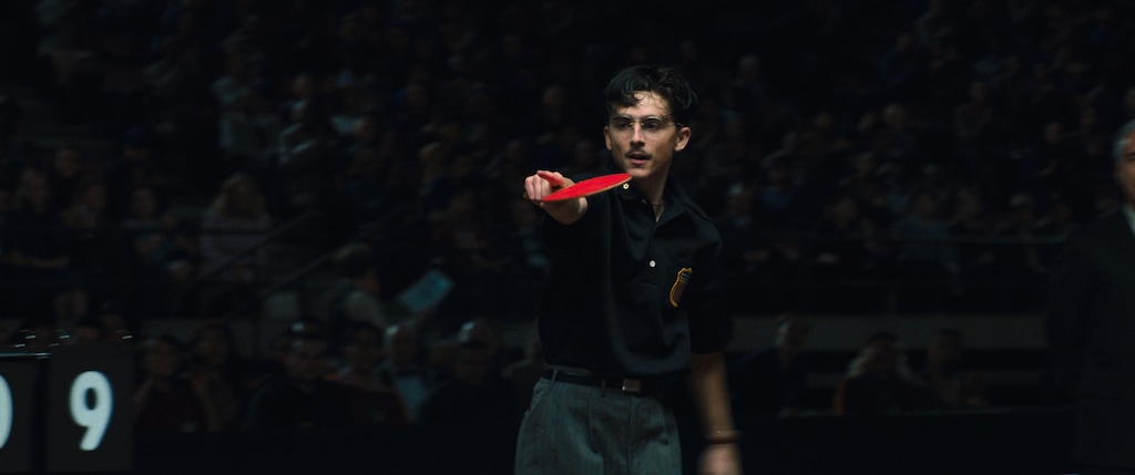 (A24) Timotheé Chalamet plays Marty Mauser, a hyper-confident table tennis champ, in director Josh Safdie's "Marty Supreme."