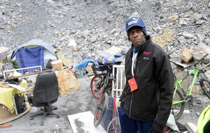 (Al Hartmann  |  The Salt Lake Tribune) 	
Ronald Ross has lived in a clean, well organized tent camp for about six months on the rocky mountainside above Victory Road north of the state Capitol building. He has a generator for lights and a television.  He is waiting for a birth certificate so that he can get an identification card to apply for a job.  Salt Lake City Police, Volunteers of America, Utah Highway Patrol, and social workers from Salt Lake City and the Veterans Administration had set up a mobile outreach center along Victory Road.