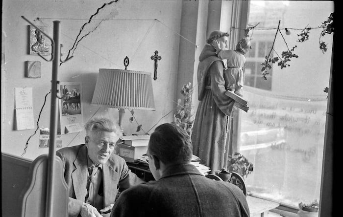 (photo courtesy Jerry Currier)  Ammon Hennacy speaks to a visitor at the Joe Hill House of Hospitality in downtown Salt Lake City in 1961. The location opened its doors as a homeless shelter in Nov. 1961, serving up to 60 people a day free of charge.