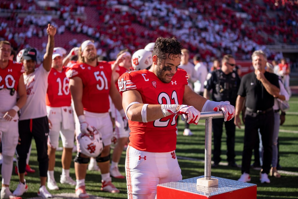 (Rick Egan | The Salt Lake Tribune)  Utah Utes linebacker Karene Reid (21) lights the U, after the Ute's 14-7 win over UCLA, in PAC-12 football action, at Rice-Eccles Stadium, on Saturday, Sept. 23, 2023.