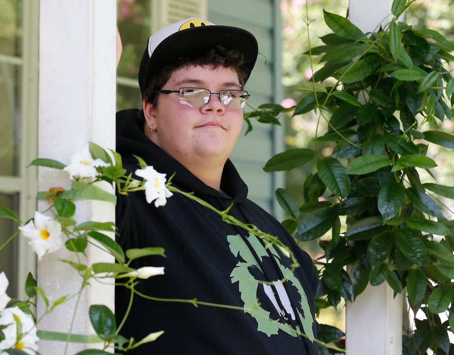FILE This Tuesday Aug. 25, 2015 file photo shows Gavin Grimm on his front porch during an interview at his home in Gloucester, Va. A U.S. appeals court has overturned a policy barring a transgender student from using the boys' restrooms at his Virginia high school.
A three-judge panel of the 4th U.S. Circuit Court of Appeals ruled Tuesday, April 19, 2016 that the Gloucester County School Board policy is discriminatory. A federal judge had earlier rejected Grimm's sex discrimination claim. (AP Photo/Steve Helber)