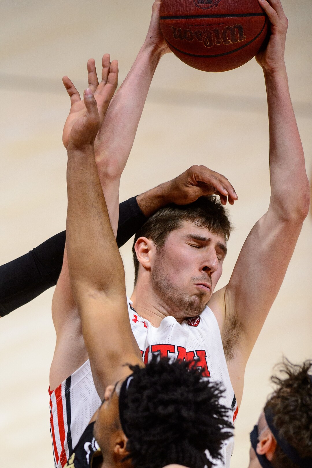(Trent Nelson  |  The Salt Lake Tribune) Utah Utes forward Riley Battin (21) rebounds as Utah hosts Colorado, NCAA basketball in Salt Lake City on Monday, Jan. 11, 2021.