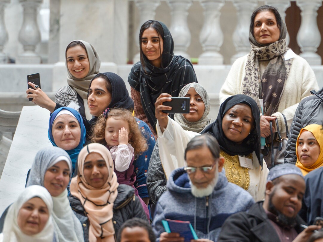 (Leah Hogsten  |  The Salt Lake Tribune) Hafsa Ahmed takes a selfie with friends Sana Ashraf and Sauleha Ibrahim while posing for pictures with fellow members of the Muslim community on the Capitol rotunda stairs. Members of the Muslim community, students from Iqra Academy of Utah and members of the Utah Muslim Civic League tour the Capitol during the inaugural Muslim Day on the Hill, Feb. 25, 2020.