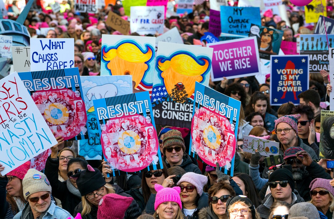 People line up on Central Park West as they take part in a rally and march highlighting equal rights and equality for women Saturday, Jan. 20, 2018, in New York. The New York protest was among more than 200 such actions planned for the weekend around the world.  (AP Photo/Craig Ruttle)