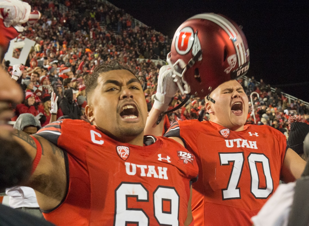 (Rick Egan  |  The Salt Lake Tribune)        
Utah Utes offensive lineman Lo Falemaka (69) and offensive lineman Jackson Barton (70) celebrate as the Utes stop the Cougars on 4th down wth just seconds left in the game, giving Utah the victory, in football action between the Brigham Young Cougars and the Utah Utes, at Rice-Eccles Stadium, Saturday, November 24, 2018.