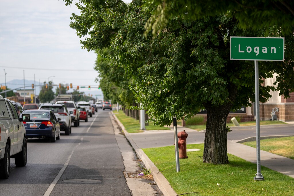 (Rick Egan | The Salt Lake Tribune)  Cars line Main Street in Logan in 2024. The city plans to start building a pedestrian underpass next month, squeezing traffic on the main drag down to one lane.